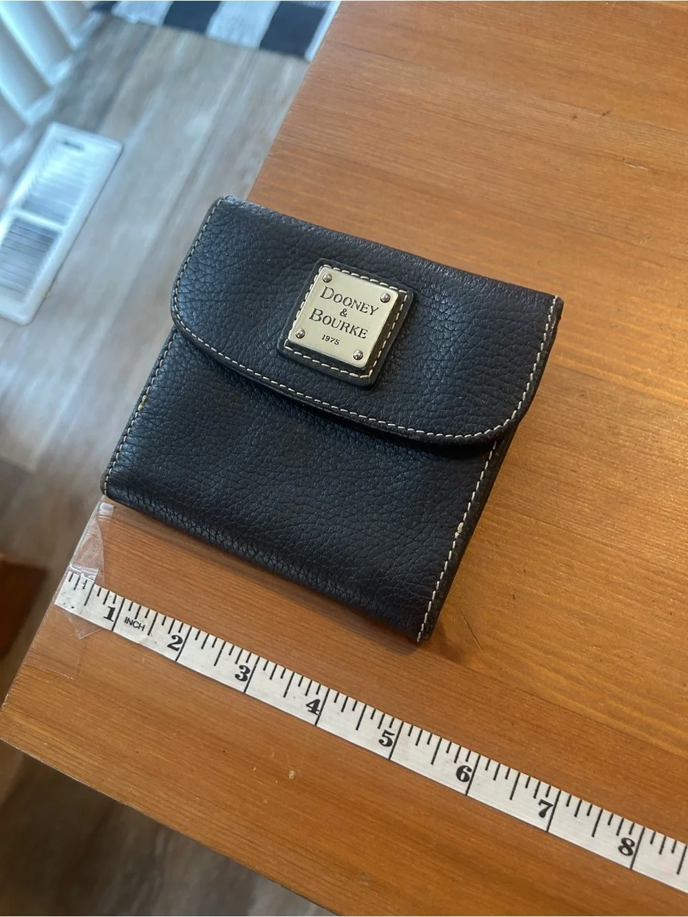 Dooney & Bourke Black Leather Fold Wallet with Logo Plaque